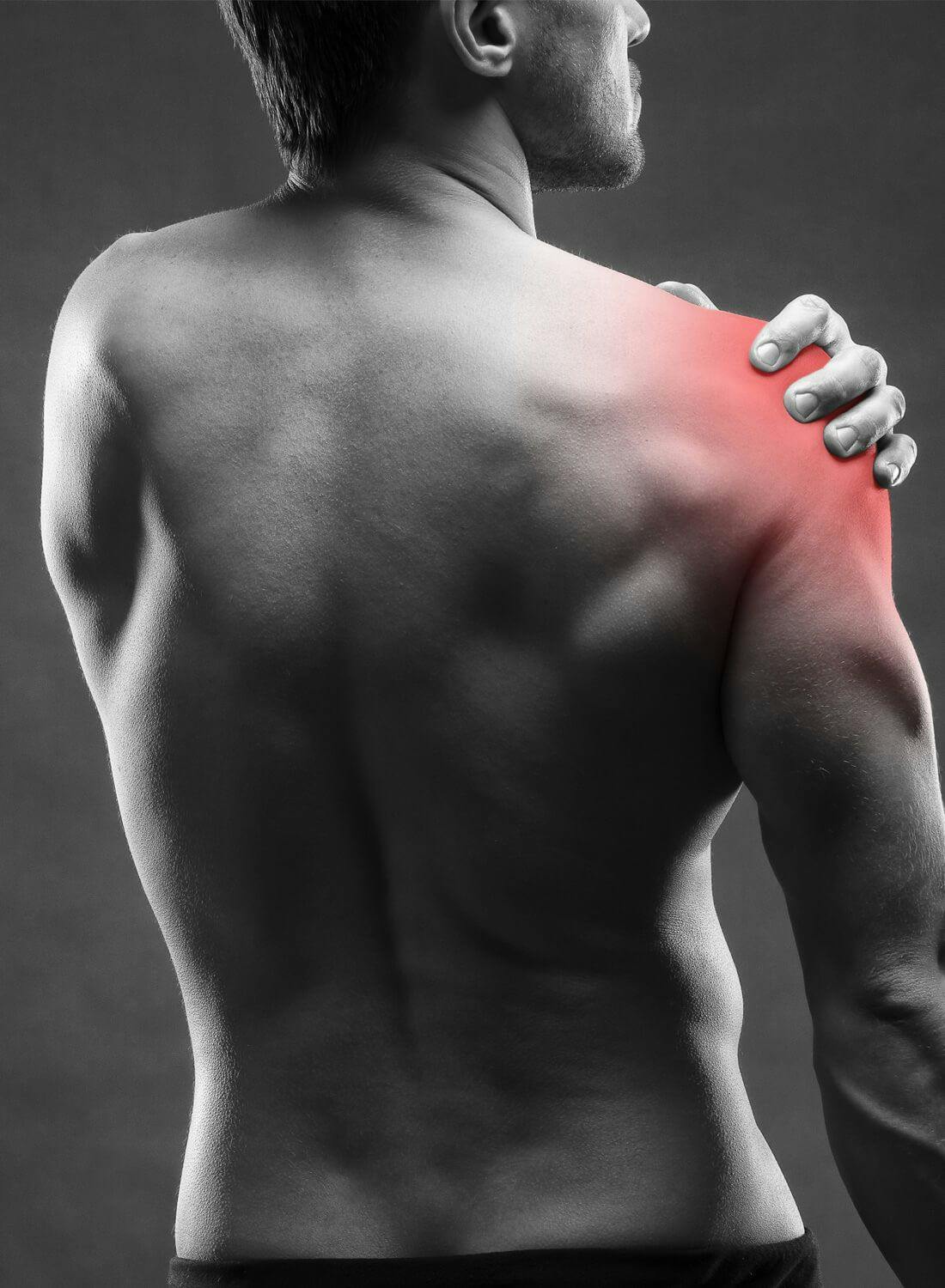 man having pain in his right shoulder